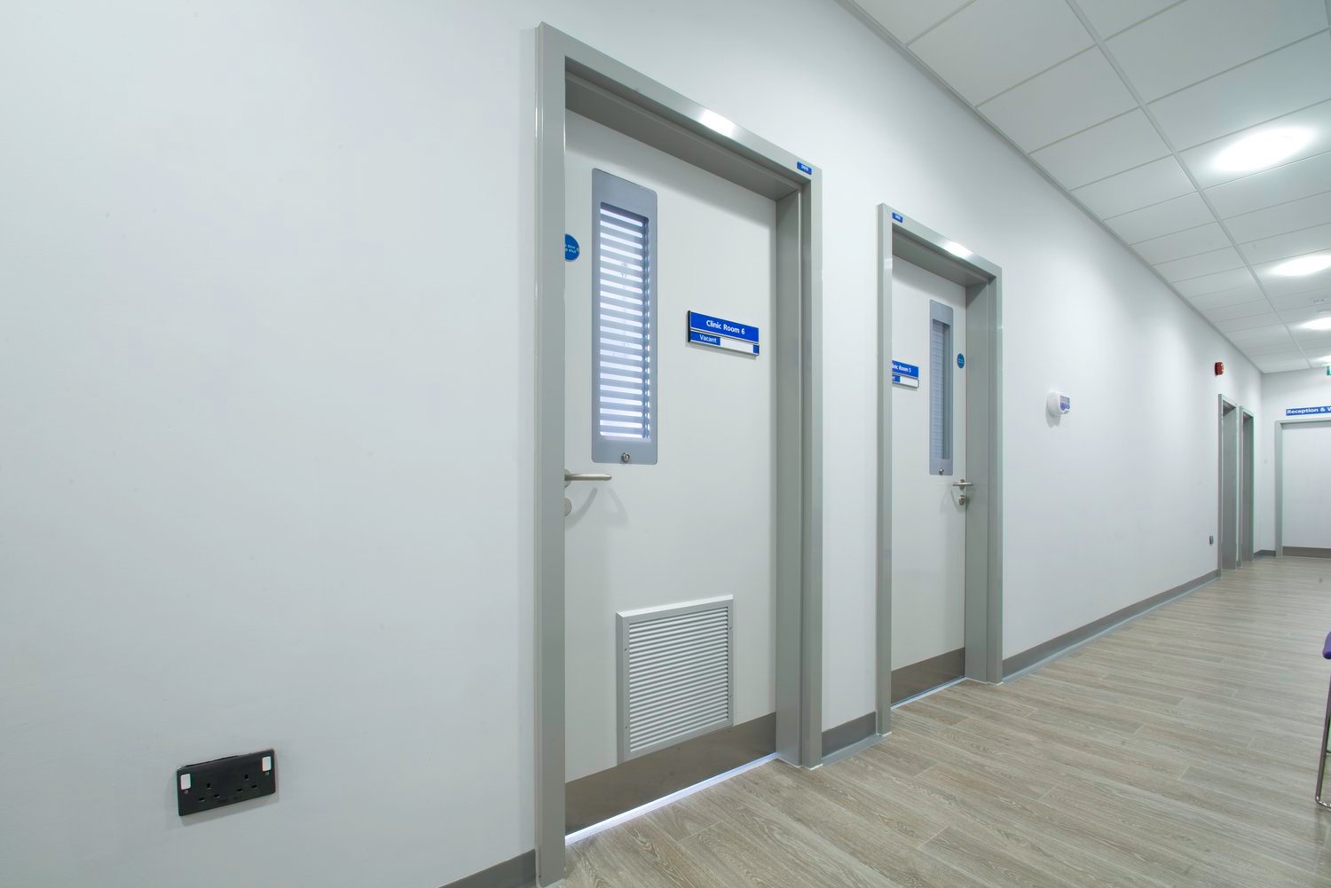 A row of white Trovex Hygidoors